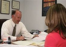 Accountant conferring with client